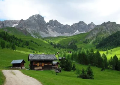 Remote alpine valley with traditional mountain huts in the Balkans.